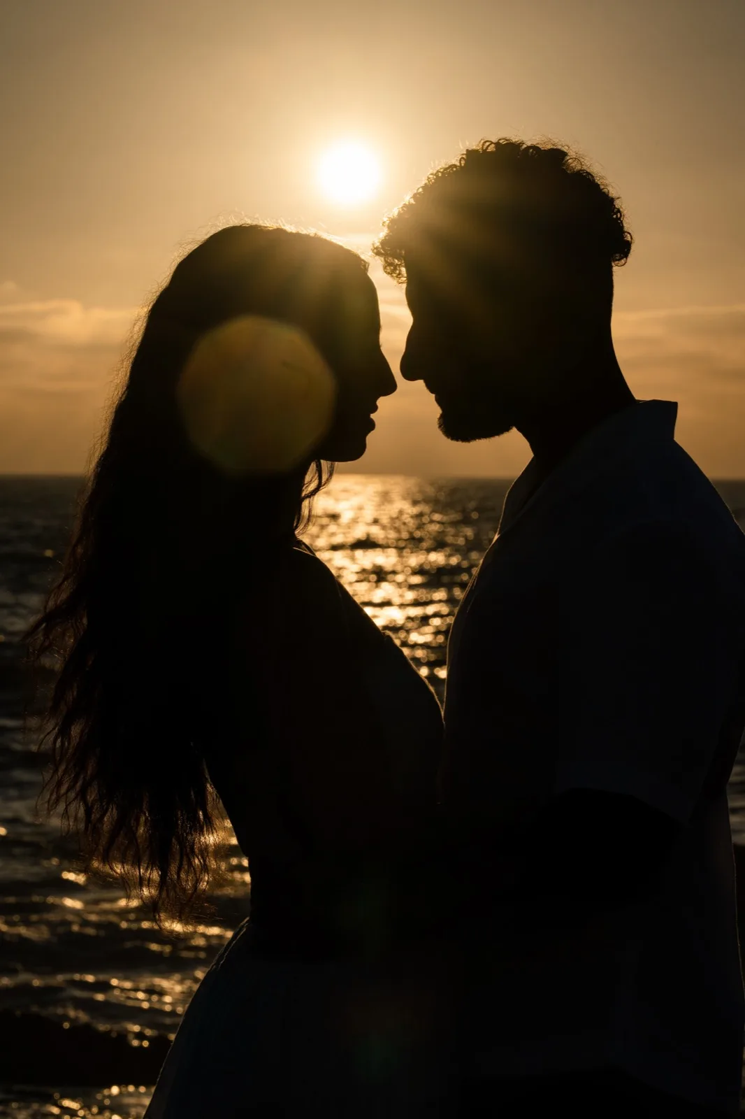 Sunset silhouette by the ocean